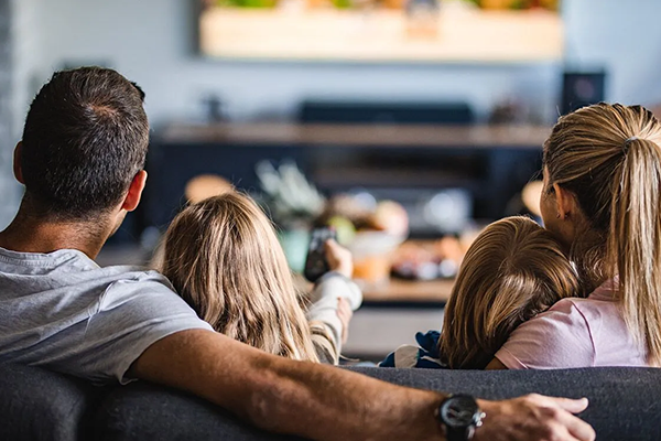 Family Watching TV Backshot