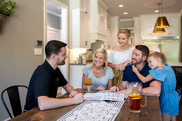 Trane Rep with Family at Kitchen Table